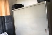 KABATI LA NGUO LA KUSLIDE